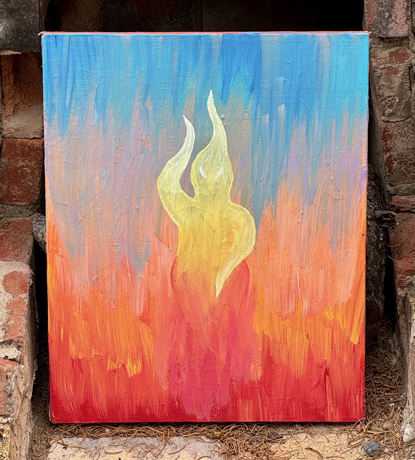 A painting of a pale flame rising through a sky-blue-to-red gradient, set in a stone fireplace niche.